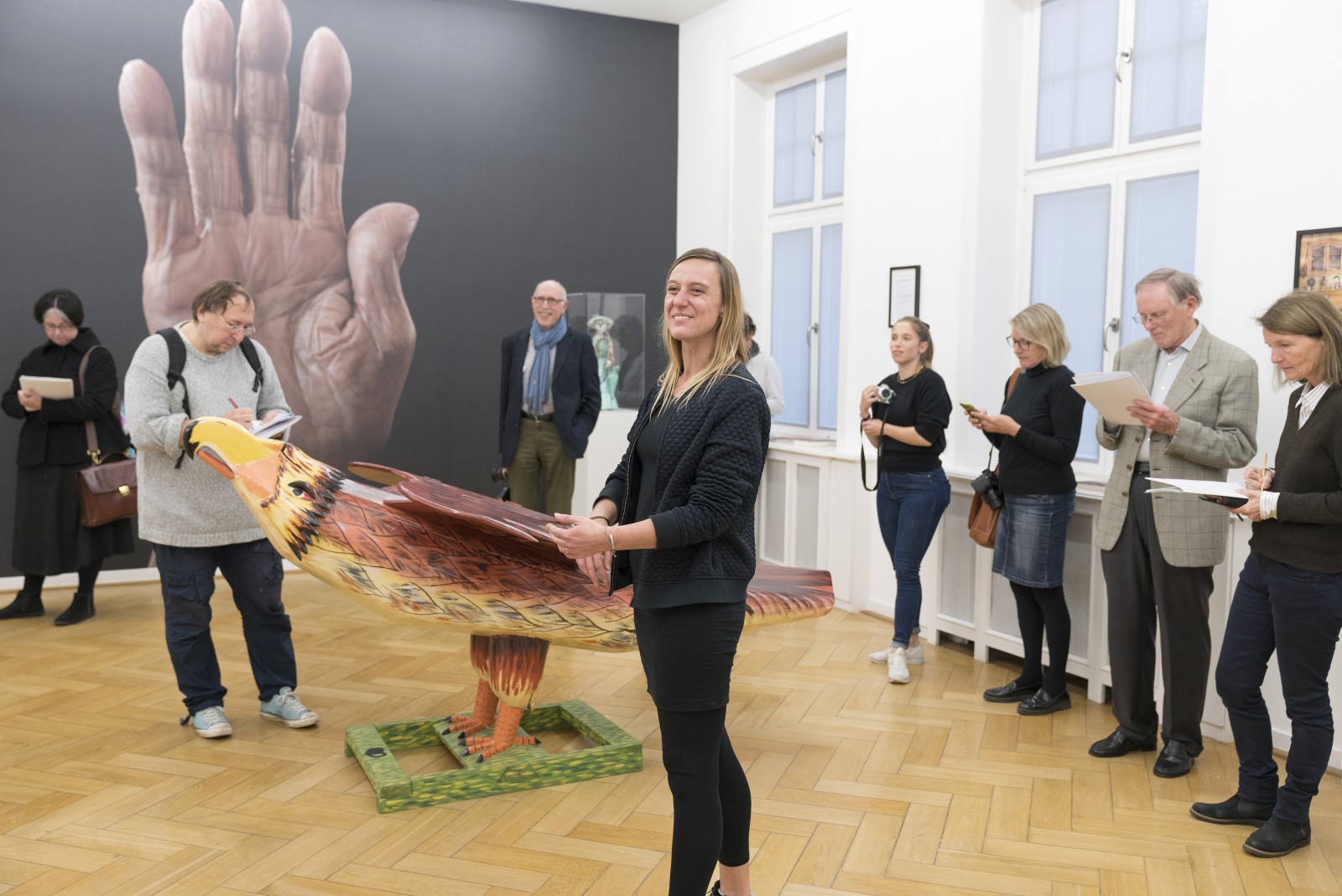 Curator Alice Pawlik in the exhibition GREY IS THE NEW PINK, Weltkulturen Museum 2018