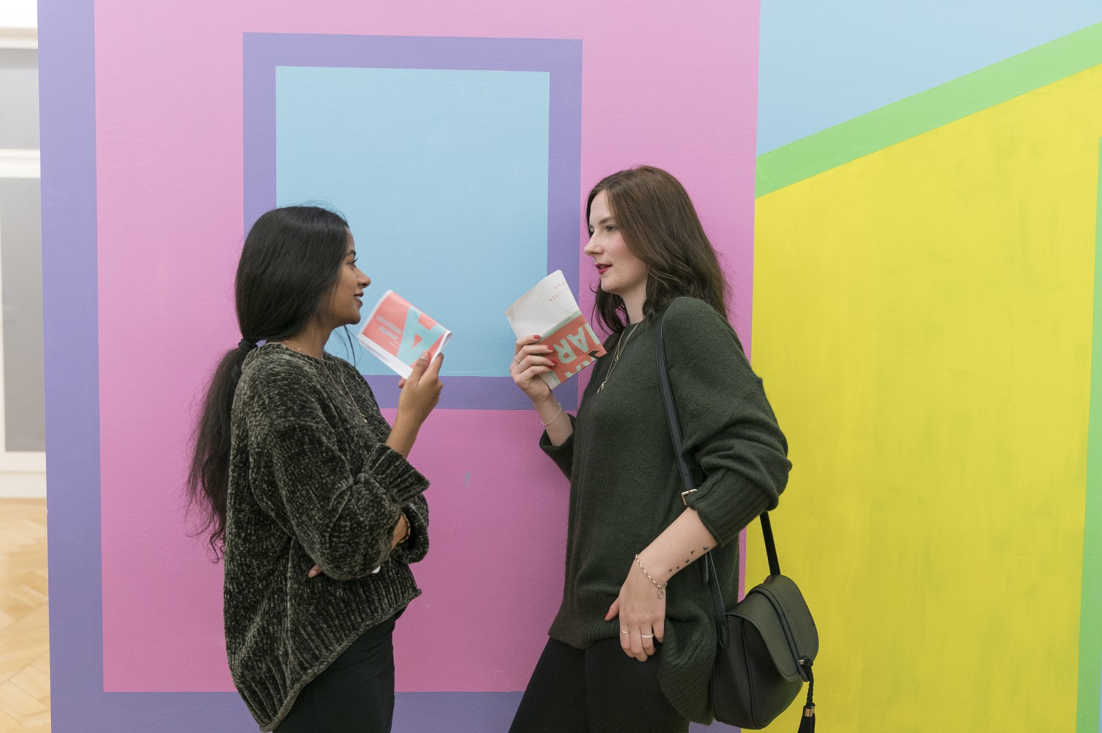 Visitors in the exhibition “Entre Terra e Mar
