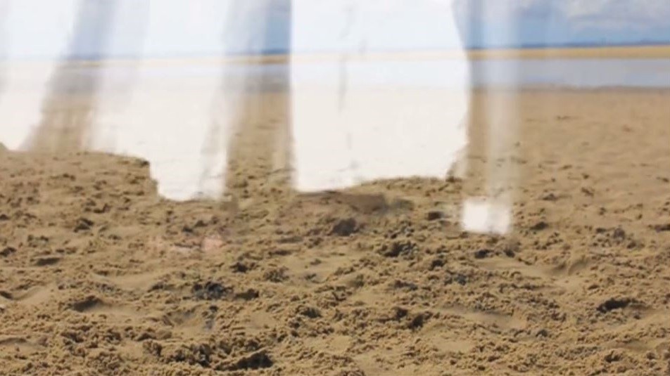 Film still “What is remembered … not only the footprints but the water too”, Kitso Lynn Lelliott, 2013