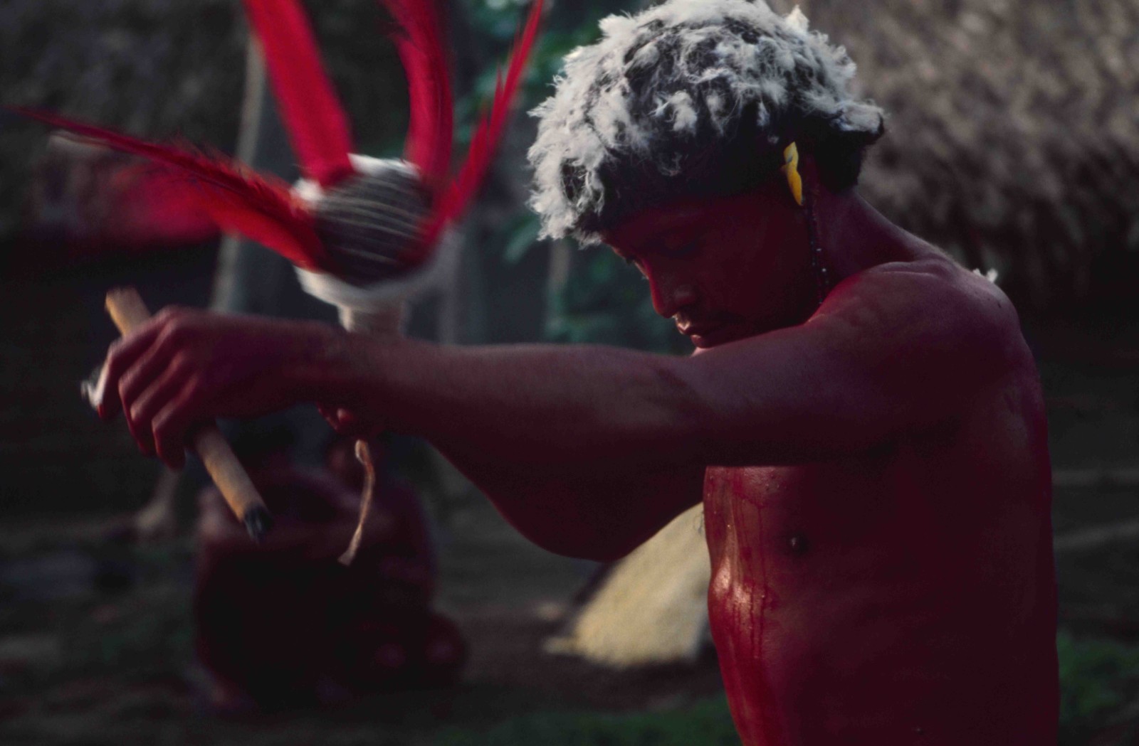 Kunipaye-ru, the most active shaman from 1981 to 1983, with his ARAY rattle and cheroot, Collection Eduardo Viveiros de Castro, Instituto Socioambiental (ISA)