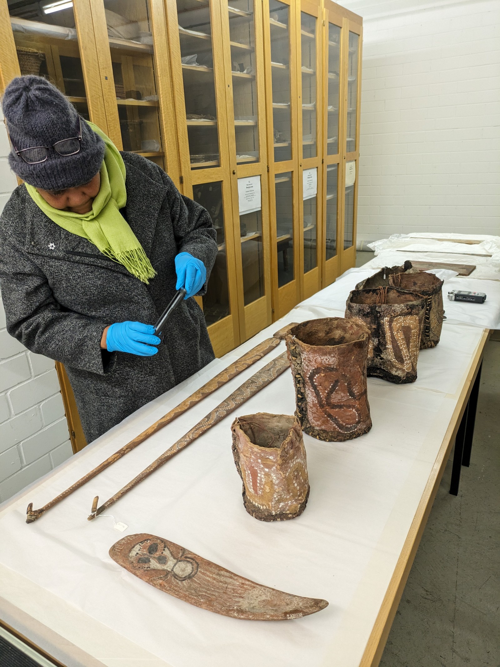 Leah Umbagai in the depot of the Weltkulturen Museum