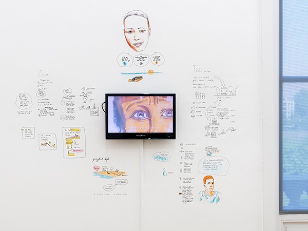 “Life notes” (illustrations) - Adrian Pourviseh & “Hell is in Libya” (film) - Adrian Pourviseh, Julie Bourdin, Emmauel Kraif, Exhibition view “SW5Y – Five years of civil sea rescue”,  Weltkulturen Museum 2020, Photo: Wolfgang Günzel